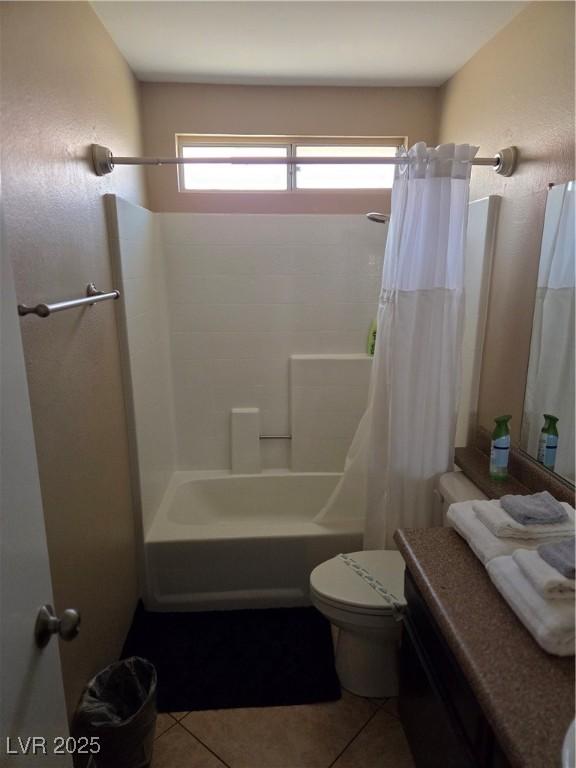 7328 Coffeyville Ave, Las Vegas, NV 89147 - bathroom with toilet, shower / bath combination with curtain, tile patterned flooring, and vanity