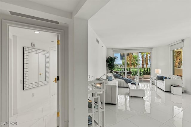 2857 Paradise Rd Unit 305, Las Vegas, NV 89109 - living area with tile patterned floors and baseboards