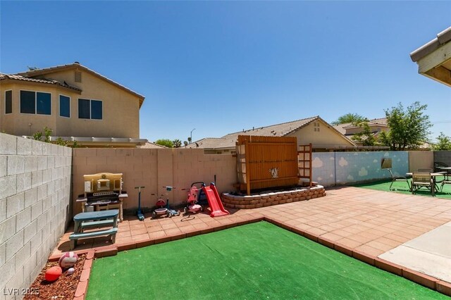 view of patio with a fenced backyard