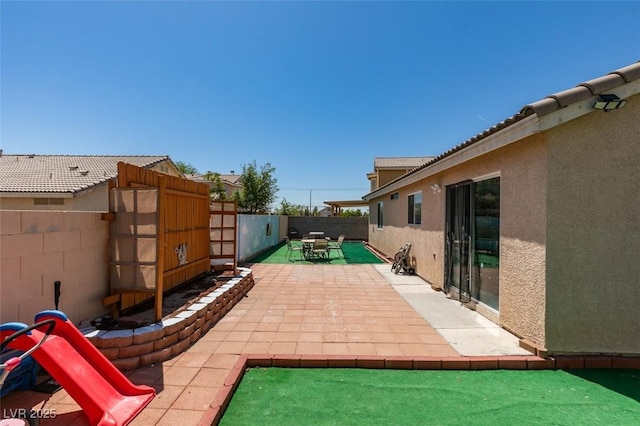 view of patio with a fenced backyard