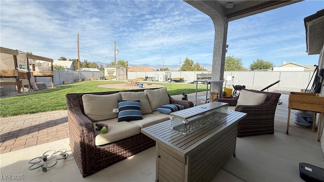 view of patio with a residential view, a playground, a shed, an outdoor living space, and a fenced backyard