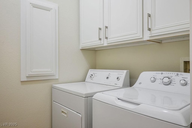 10657 Sapphire Vista Ave, Las Vegas, NV 89144 - laundry area featuring washer and dryer and cabinet space