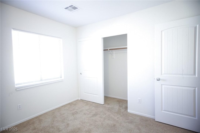 3652 Remington Grove Ave, North Las Vegas, NV 89081 - unfurnished bedroom featuring carpet flooring, a closet, visible vents, and baseboards