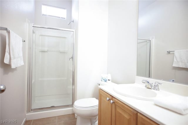3652 Remington Grove Ave, North Las Vegas, NV 89081 - bathroom with toilet, a stall shower, tile patterned floors, and vanity