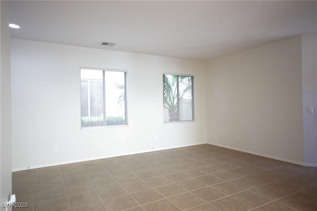 3652 Remington Grove Ave, North Las Vegas, NV 89081 - empty room with visible vents and baseboards