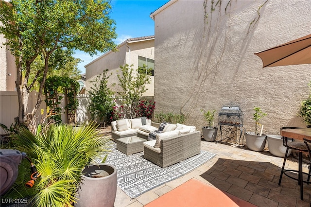 view of patio / terrace with fence and outdoor lounge area