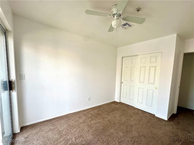 3550 Bay Sands Dr Unit 1005, Laughlin, NV 89029 - unfurnished bedroom with carpet flooring, a closet, and a ceiling fan