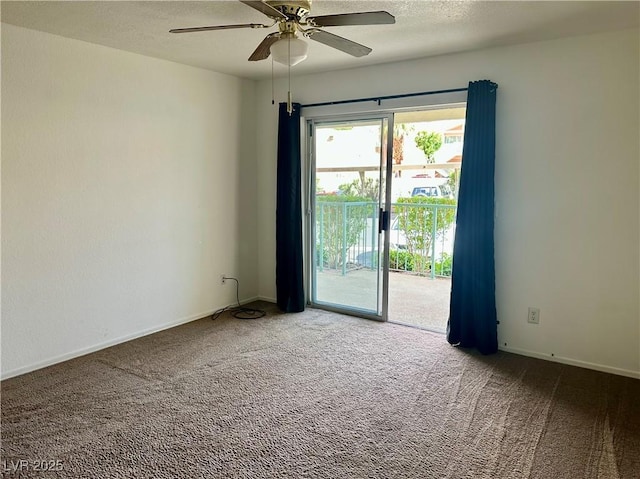 empty room with ceiling fan, a textured ceiling, and carpet flooring
