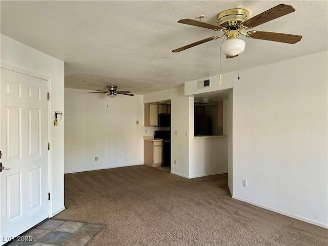 3550 Bay Sands Dr Unit 1005, Laughlin, NV 89029 - unfurnished living room featuring a ceiling fan, carpet flooring, and a textured ceiling