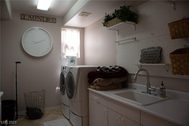 9905 Fox Springs Dr, Las Vegas, NV 89117 - laundry room featuring washer and clothes dryer and cabinet space