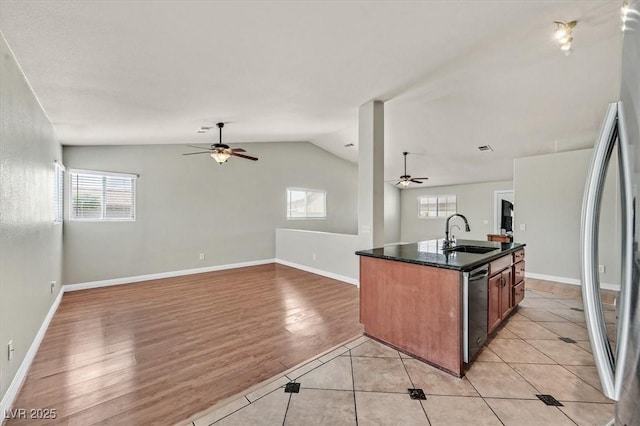 2805 El Cubano Ct, North Las Vegas, NV 89030 - kitchen with ceiling fan, open floor plan, a sink, and vaulted ceiling