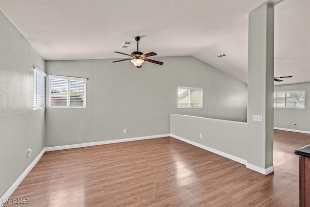 2805 El Cubano Ct, North Las Vegas, NV 89030 - unfurnished room featuring ceiling fan, visible vents, plenty of natural light, and wood finished floors