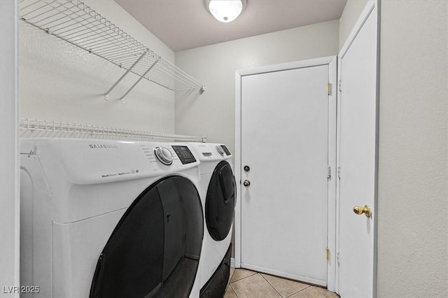 2805 El Cubano Ct, North Las Vegas, NV 89030 - washroom with laundry area, light tile patterned floors, and separate washer and dryer
