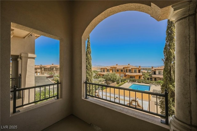 balcony featuring a residential view