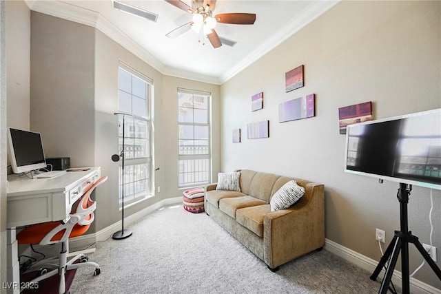 office area with carpet floors, ornamental molding, ceiling fan, baseboards, and visible vents