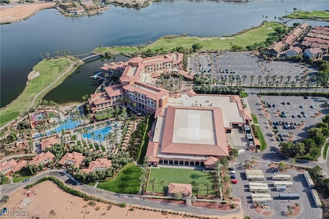 birds eye view of property featuring a water view and golf course view