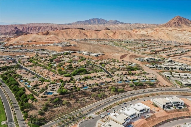 aerial view featuring a mountain view and a residential view