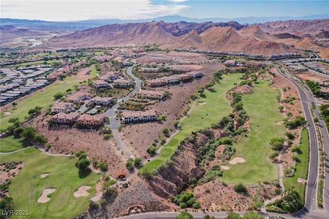 bird's eye view featuring a residential view, a mountain view, and view of golf course