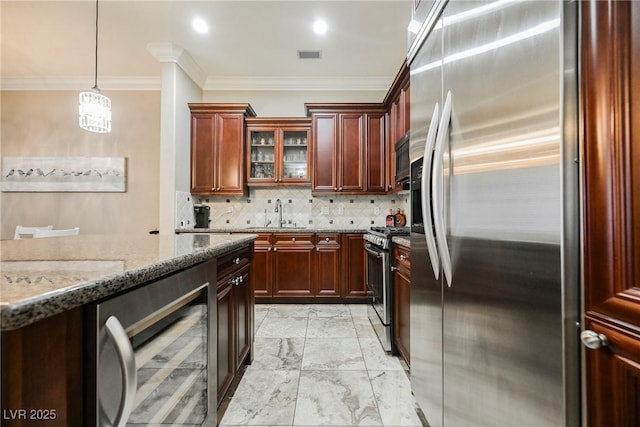 kitchen with light stone counters, crown molding, beverage cooler, stainless steel appliances, and marble finish floor