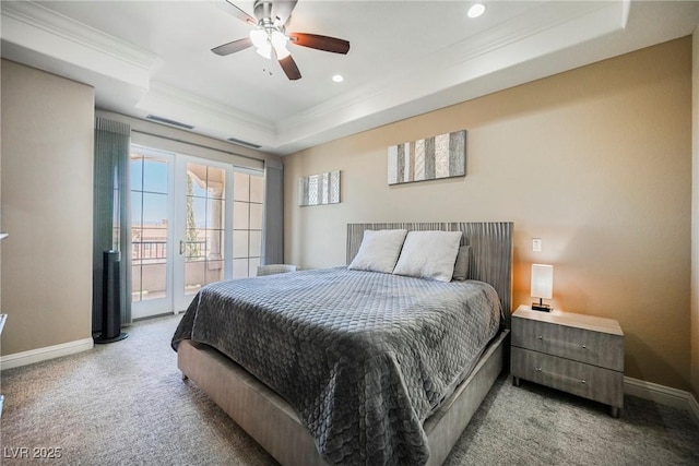 carpeted bedroom with crown molding, visible vents, a tray ceiling, access to exterior, and baseboards