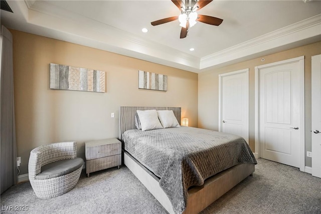 bedroom with crown molding, light colored carpet, a raised ceiling, ceiling fan, and recessed lighting