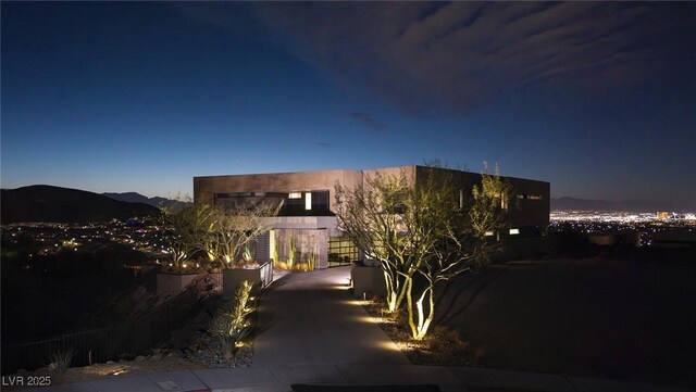 811 Magnum Cliff Ct, Henderson, NV 89012 - view of front of home featuring fence and a mountain view