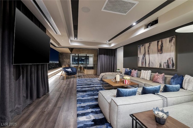 811 Magnum Cliff Ct, Henderson, NV 89012 - cinema featuring a raised ceiling, recessed lighting, visible vents, and wood finished floors