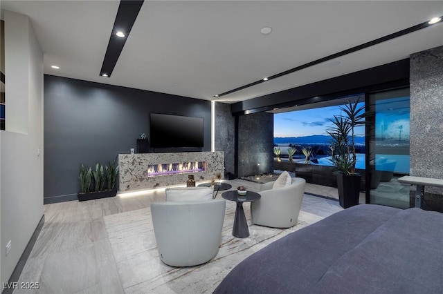 811 Magnum Cliff Ct, Henderson, NV 89012 - interior space with marble finish floor, a fireplace, baseboards, and recessed lighting