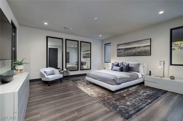 811 Magnum Cliff Ct, Henderson, NV 89012 - bedroom with dark wood finished floors, visible vents, baseboards, and recessed lighting