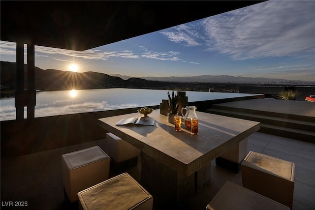 811 Magnum Cliff Ct, Henderson, NV 89012 - view of patio / terrace with a mountain view and an outdoor bar