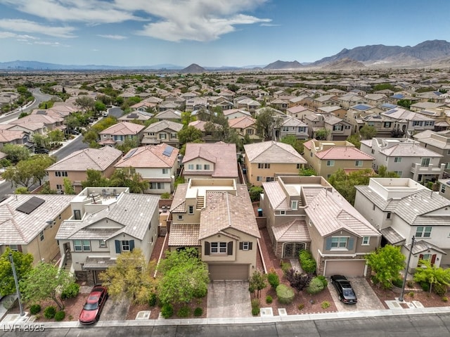 bird's eye view with a mountain view and a residential view