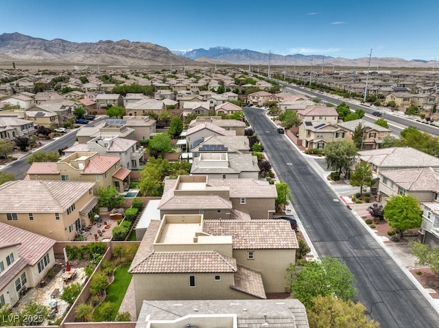 bird's eye view with a residential view and a mountain view