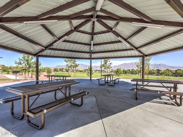 view of home's community featuring a mountain view, a patio, and a gazebo