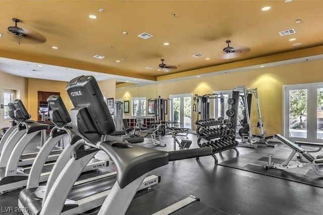 exercise room with recessed lighting, a ceiling fan, and visible vents