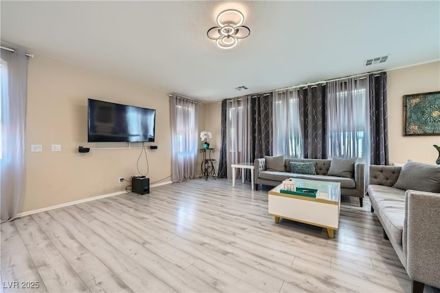 4902 Guysborough St, Las Vegas, NV 89148 - living room with wood finished floors and baseboards