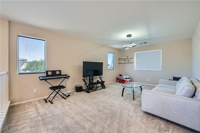 4902 Guysborough St, Las Vegas, NV 89148 - carpeted living room with plenty of natural light and baseboards