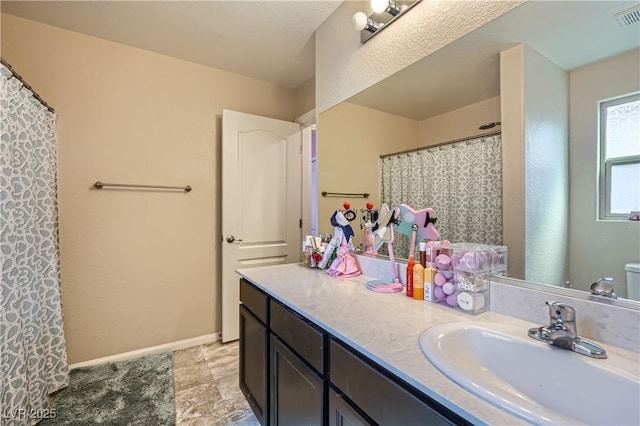 4902 Guysborough St, Las Vegas, NV 89148 - bathroom featuring vanity and baseboards