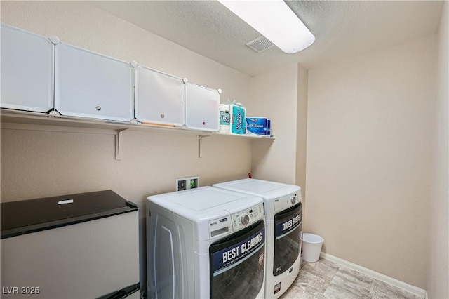4902 Guysborough St, Las Vegas, NV 89148 - laundry area with washing machine and dryer, cabinet space, and baseboards
