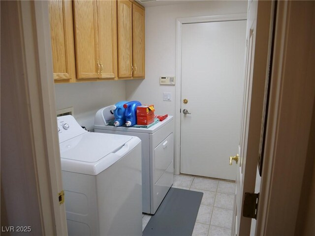 6508 Alpine Forest Ct, Las Vegas, NV 89149 - laundry area with separate washer and dryer, cabinet space, and light tile patterned flooring