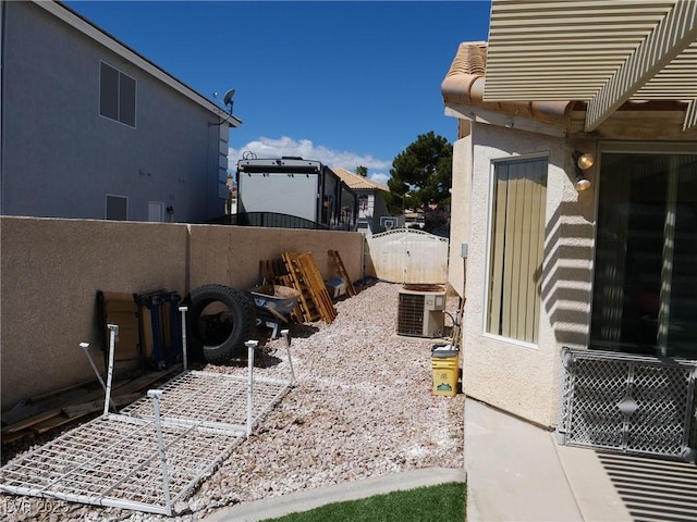6508 Alpine Forest Ct, Las Vegas, NV 89149 - view of patio / terrace with central AC unit and a gate