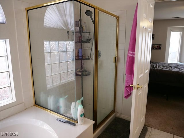 6508 Alpine Forest Ct, Las Vegas, NV 89149 - bathroom with a shower stall, ensuite bathroom, a bath, and tile patterned floors