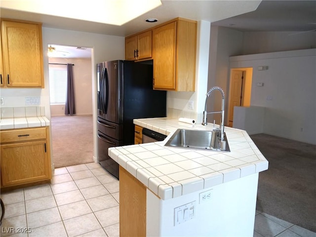 6508 Alpine Forest Ct, Las Vegas, NV 89149 - kitchen with light carpet, a sink, tile countertops, a peninsula, and freestanding refrigerator