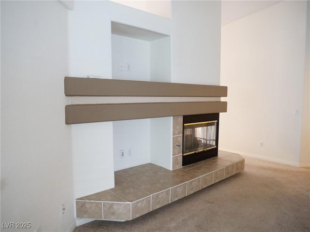 6508 Alpine Forest Ct, Las Vegas, NV 89149 - detailed view of a tiled fireplace, carpet flooring, and baseboards