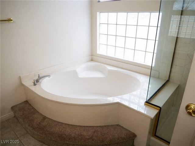 6508 Alpine Forest Ct, Las Vegas, NV 89149 - bathroom with a bath and tile patterned flooring