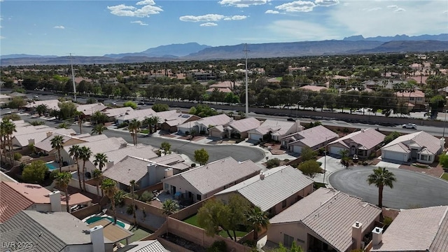 drone / aerial view featuring a mountain view and a residential view