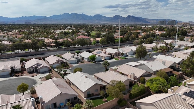 drone / aerial view with a residential view and a mountain view