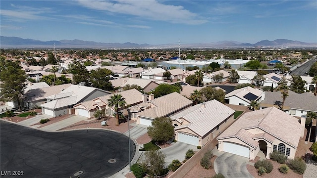 aerial view with a mountain view and a residential view