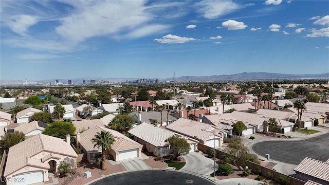 drone / aerial view with a mountain view and a residential view