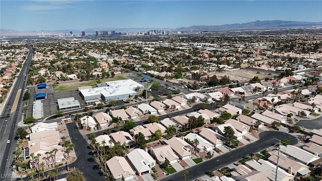 drone / aerial view with a residential view and a mountain view