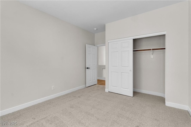 10613 Turquoise Valley Dr, Las Vegas, NV 89144 - unfurnished bedroom with carpet flooring, baseboards, and a closet